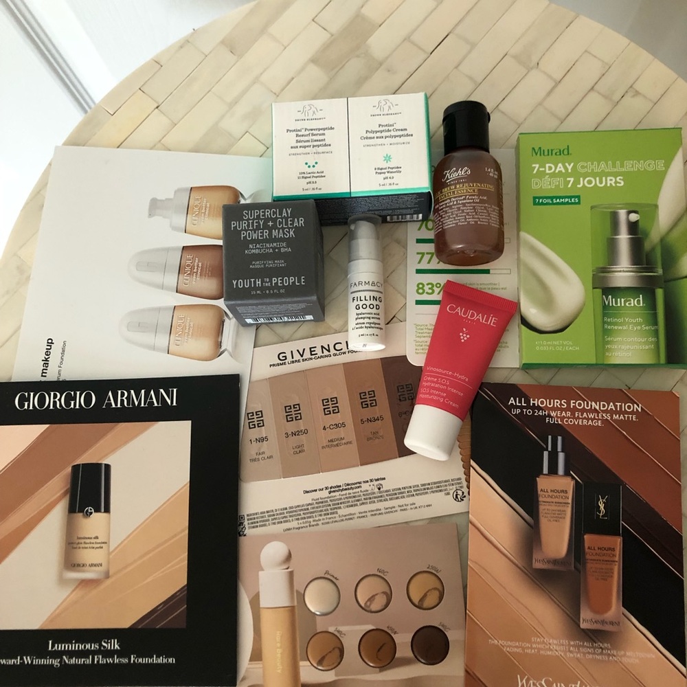 Huge Sephora sample bundle with skincare items and foundation cards